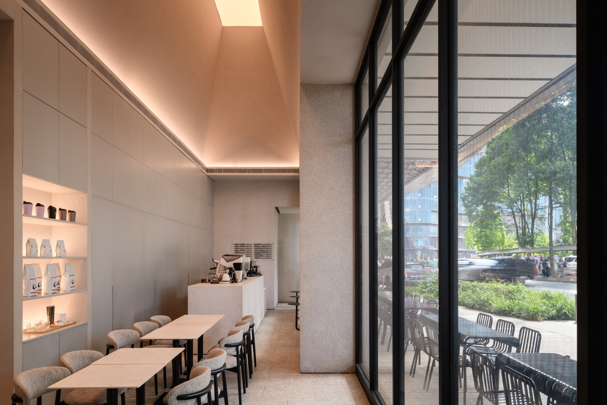 Minimal architectural cafe interior design, ambience lighting, beige cafe, Artelier, Kuala Lumpur