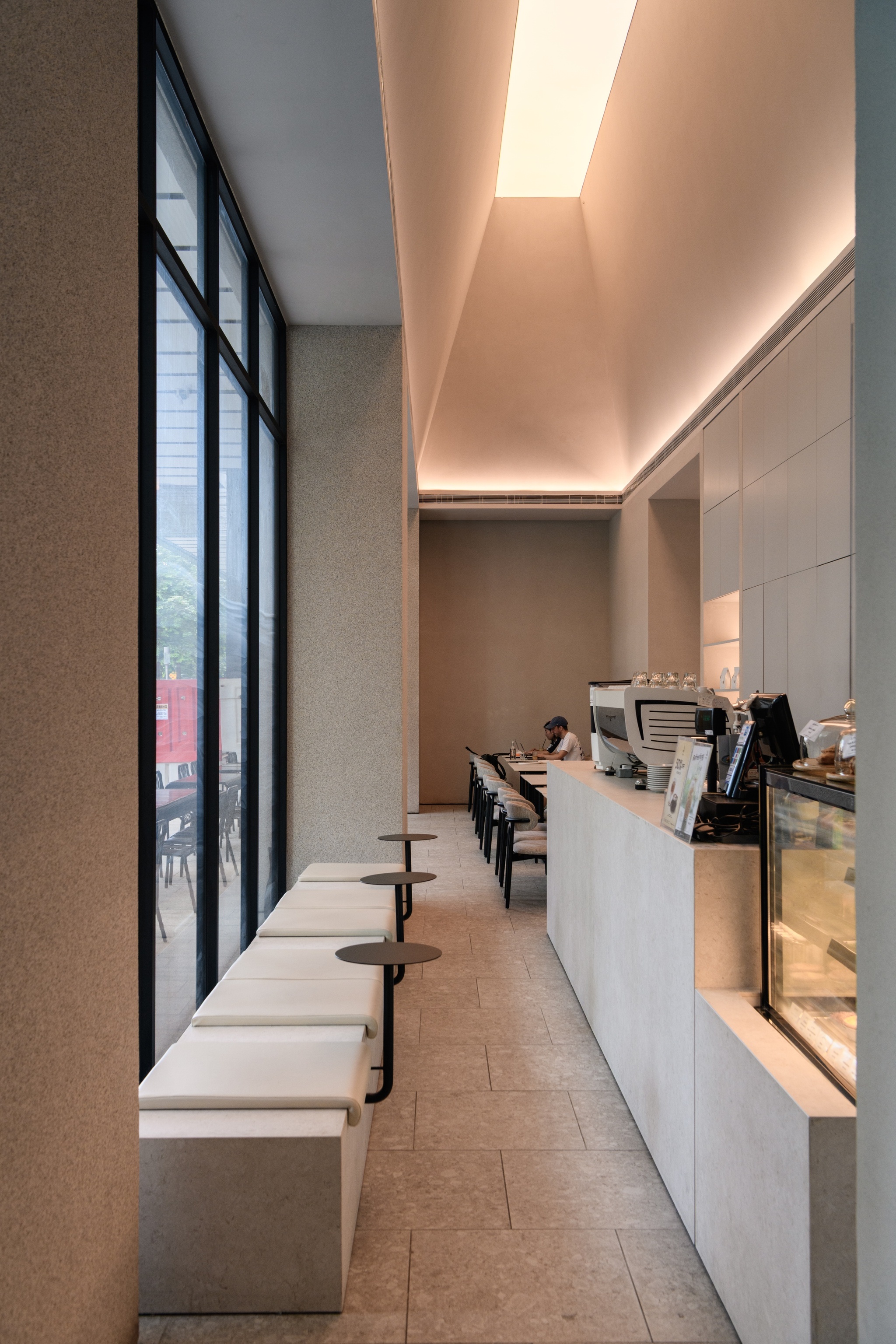 Minimal architectural cafe interior design, ambience lighting, beige cafe, Artelier, Kuala Lumpur