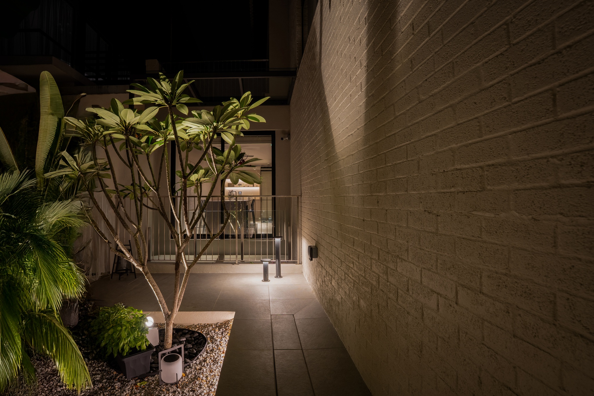 Modern luxury exterior facade at night, landscape lighting, Danau Villa, Kuala Lumpur